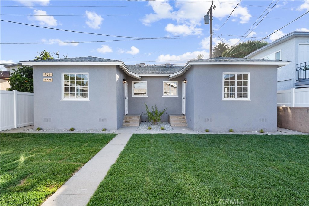 Live in style in this beautifully remodeled 1-bedroom, 1-bath unit tucked away in the back of a fully upgraded triplex in a prime Long Beach location. The unit features a modern kitchen with shaker cabinetry, quartz countertops, stainless steel appliances, and a designer-tiled bathroom with an updated vanity and contemporary fixtures. Inside, you’ll find luxury vinyl plank flooring, fresh paint, updated lighting, high squared-off baseboards, and convenient in-unit laundry. The property has undergone significant system upgrades, including updated electrical panels to support modern appliances and refreshed plumbing. A newly poured concrete driveway, fresh sod with irrigation, and modern fencing add privacy and curb appeal. Enjoy quiet, comfortable living with off-street parking included and easy access to local shops, restaurants, and freeways. Available for immediate move-in.