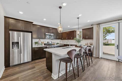 Photo of 16755 Coyote Bush Drive DR #50, San Diego, CA 92127 (MLS # 260015554SD)