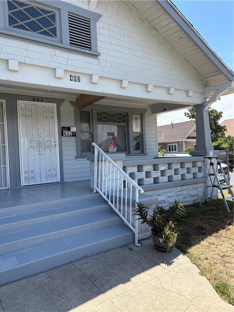 Photo of 402 E 43rd Place, Los Angeles, CA 90011 (MLS # DW26151941)