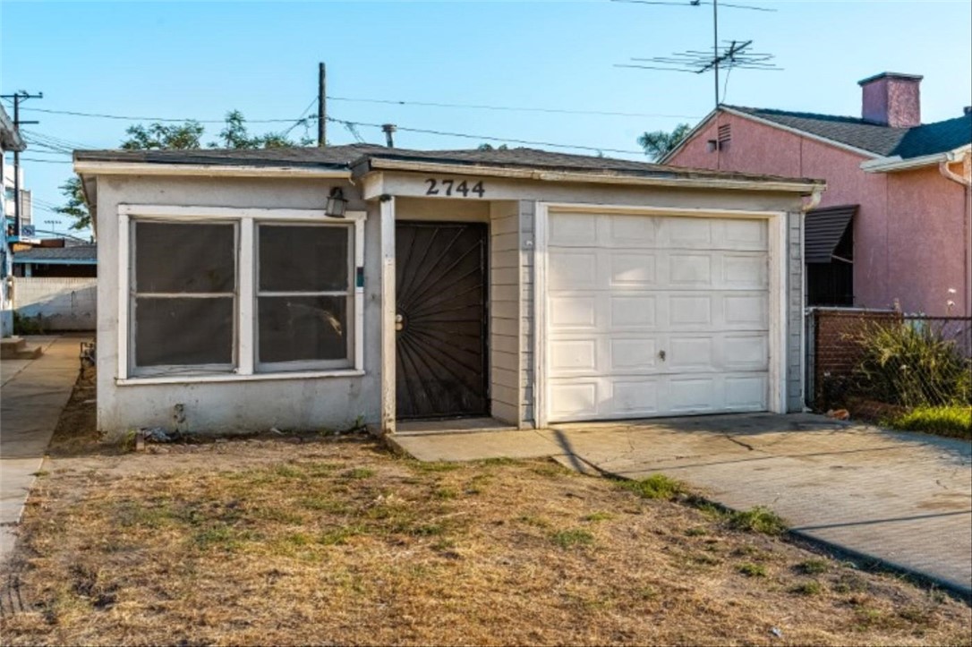 Welcome to 2744 E Madison St — a single-story, bungalow packed with potential including a large, fenced backyard and convenient garage! If you’ve been on the hunt for a competitive-priced detached home, wait no more. This is an excellent opportunity for an owner-occupant to make it their own—or for an investor to add to their portfolio. Inside offers an efficient, light-filled living space and open floor plan, making everyday living a breeze. The primary bedroom is perfectly posed in the rear of the home allow for privacy and versatile use of the second bedroom. Pass by the convenient laundry area to head outside to a dream-ready backyard with new fencing. This spacious area is brimming with opportunity to lounge, play, barbecue, garden, and even let Rover roam free. Located near Dominguez Park & Aquatic Center with easy access to CSUDH & Dignity Health Sports Park, shopping/dining at South Bay Pavilion, and quick links to 405/710/91, this gem has so much to offer!