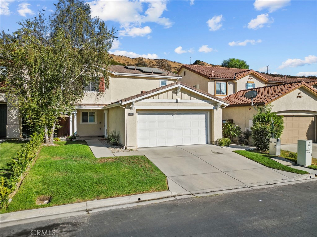 Welcome to 13204 Alta Vista Way, a beautifully upgraded home located in a private gated community in the serene neighborhood of Sylmar. This residence has been thoughtfully updated throughout and offers a perfect balance of style, comfort, and functionality. The modern kitchen features new cabinets and quartz countertops, while the living area showcases a custom stone entertainment wall with LED lighting and a cozy fireplace. Signature bamboo flooring runs throughout both levels, complemented by tile floors in the upstairs bathrooms, an upgraded walk-in closet, new windows, a refreshed downstairs vanity, and new toilets in the kids’ and guest bathrooms. The home’s exterior shines with a refurbished front porch complete with new ceiling fans, upgraded side gates, and a backyard retreat featuring turf, pavers, a covered pergola, a small above-ground pool, and an exterior TV—perfect for entertaining or relaxing. Additional highlights include a new garage door opener, a water softener system, and a fully paid-off solar system for energy efficiency. This home also comes equipped with premium stainless steel appliances, including a Whirlpool washer and dryer, Whirlpool dishwasher, Whirlpool microwave, LG refrigerator, and LG stove—all included in the sale, adding even more value and convenience for the next owner. Residents of this private community enjoy resort-style amenities, including a sparkling pool and jacuzzi with panoramic views, a basketball court, a kids’ playground, and a private park. The neighborhood is quiet, family-friendly, and offers scenic views of the surrounding mountains and valleys, as well as proximity to hiking trails and outdoor recreational spaces. Within two miles, you’ll find Herrick Avenue Elementary, Gridley Street Elementary, Olive Vista Middle, and Sylmar Charter High School, making this a convenient choice for families. Local attractions include El Cariso Park with sports fields and picnic areas, the Nethercutt Museum with its classic car collection, and Wilson Canyon Park with beautiful hiking trails. Dining, shopping, and everyday conveniences are just minutes away, with easy access to the 210 and 5 freeways for a smooth commute to other parts of Los Angeles. 13204 Alta Vista Way is more than just a home—it’s a lifestyle. With extensive upgrades, premium community amenities, valuable included appliances, and a location that combines natural beauty with convenience, this property is a rare opportunity in Sylmar.