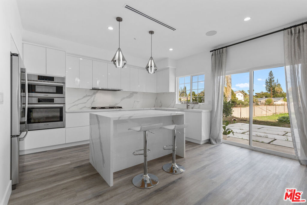 Properties 2 16731 PARTHENIA Street 5