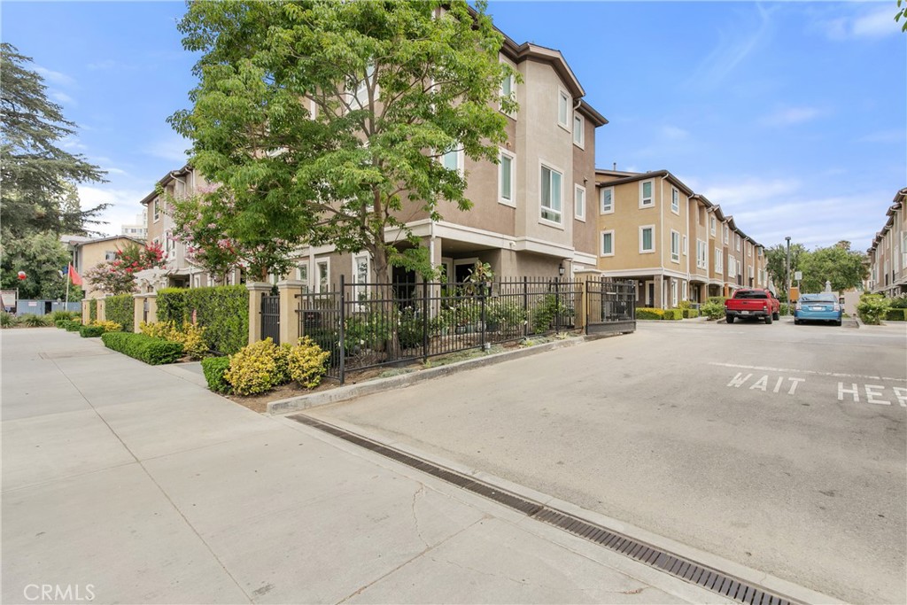 RARE 2.875% ASSUMABLE LOAN – POTENTIAL HUGE MONTHLY SAVINGS! Tucked quietly at the back of the sought-after Azalea gated community, this 3-bedroom, 3-bathroom single family residence is designed to make you feel at home from the moment you step inside. You’ll instantly notice the warm hardwood floors, the glow of recessed lighting, and the natural light that fills every room. Picture yourself cooking in a kitchen equipped with stainless steel appliances, hosting friends in the open-concept living space, or simply unwinding in your spacious primary suite with a walk-in closet and private bath. Need room for guests, a home office, or multigenerational living? You’ve got it! One of the guest bedrooms even comes with its own bathroom and walk-in closet — because everyone deserves their own space. Step outside and discover the kind of amenities that make weekends better — grassy park-like grounds, picnic tables, BBQ areas, and yes, plenty of guest parking. You are just minutes away from everything the San Fernando Valley has to offer. You'll find major retailers in The Plant Shopping Center that also features a movie theater. In addition to that you are nearby restaurants, grocery stores, and other shopping options. Easy access to freeways or plenty of public transportation such as metro bus lines and the metrolink if that's your vibe. Come take a look — and when you do, you’ll realize this isn’t just a home.
It’s the one you’ve been waiting for.