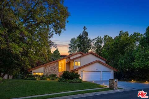 Photo of 4070 Falling Leaf Drive, Encino, CA 91316 (MLS # 26846603)