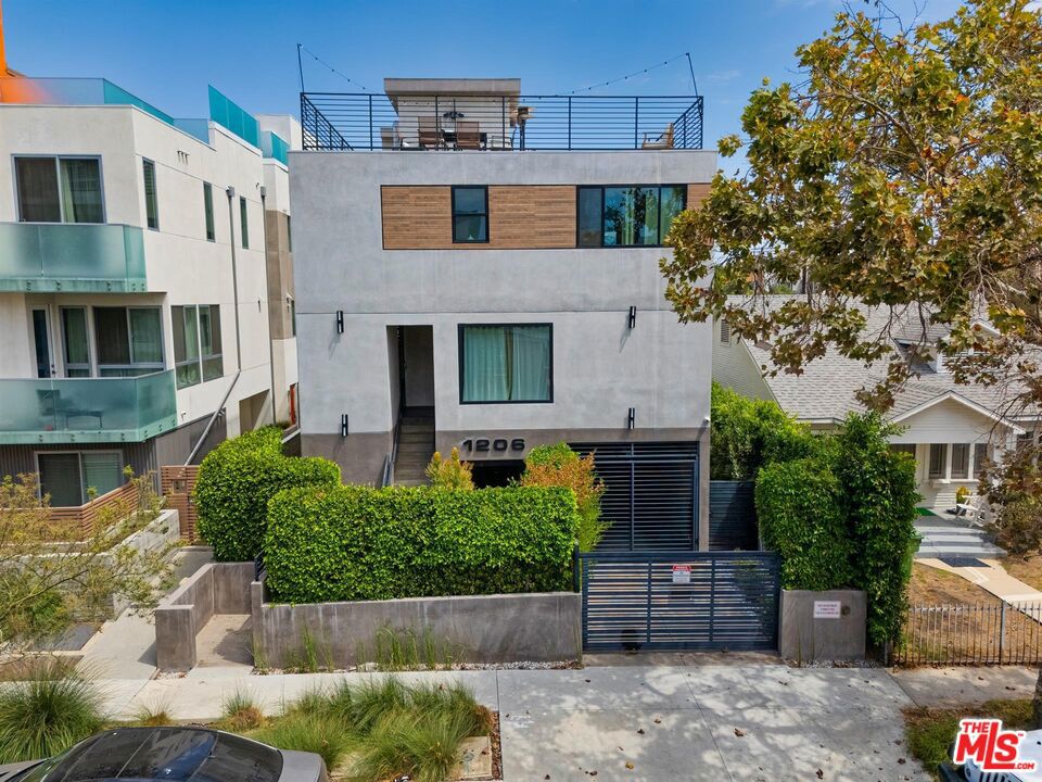 We are pleased to present 1206 N Sycamore Avenue, a rare opportunity to acquire a modern four-unit multifamily property in the heart of Hollywood, one of Los Angeles' most dynamic rental markets. Built in 2019 to condo specs, the property offers contemporary construction and design, minimizing near-term maintenance while maximizing long-term investment stability. Situated on a 6,004 square foot lot zoned LARD1.5, the building encompasses approximately 6,235 gross square feet of living space. Interior amenities include the following: LG stainless steel appliances; Custom Italian kitchen cabinetry; White quartz countertops; Central HVAC powered through Nest; LG stacked washer/dryers; Glazed porcelain flooring in the bathrooms; Freestanding bathtub in the primary bathroom, along with a double sink vanity; Calacatta walls in the bathrooms imported from Spain; Custom closets; Private rooftop decks. Each unit benefits from the quality and efficiency of newer construction, providing tenants with an attractive living environment and investors with strong rental demand in a supply-constrained market.