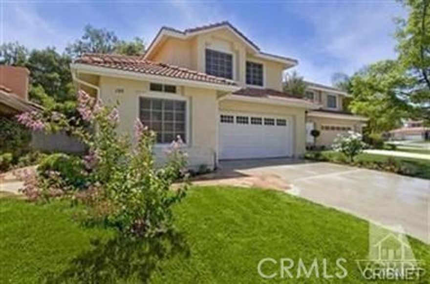 Bright and open Oak Park home in desirable Montego Tract with wood floors, carpeted bedrooms, and featuring four bedrooms, three baths with one bed and bath downstairs. Open Eat-in kitchen plus formal dining and living room. Brick fireplace in family room, extra large master suite with sitting area and walk-in closet plus separate tub/shower. Cathedral vaulted ceilings with lots of windows brings the sunshine in. Flagstone porch, walkway and lush patio yard that backs to greenbelt with lots of privacy. Two community pools and playground make this a great neighborhood to raise a family. Walking distance to award winning schools, shopping and close to the beach. The house is within walking distance to Red Oak Elementary School. Other Blue Ribbon and award winning schools are Medea Creek Middle school and Oak Park High School.