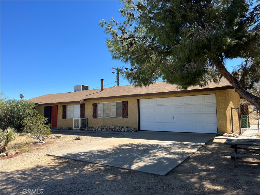 BEST VALUE in UPPER FRIENDLY HILLS! View property, a sizable 2-bedroom 1 bath home with attached garage. Includes a bonus room! Perched nicely in the always desirable neighborhood of Friendly Hills with towering pine trees and mature vegetation, this charmer boasts the allure of Joshua Tree National Park nearby. Also features central AC and a cozy wood stove and rooftop solar panels to reduce energy bills. Great outdoor space with a fully fenced back yard and covered patio and storage shed. Friendly Hills Elementary School is walking distance. Won't last at this price! Come see today.