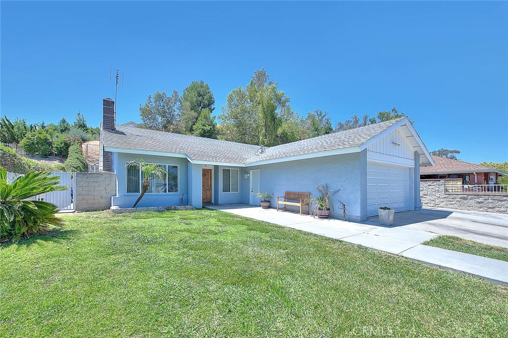 Chino Hills SINGLE story pool/spa home with gated RV parking. Featuring 3 bedrooms and 2 bathrooms with a nicely upgraded interior. Upgraded laminate plank flooring throughout interior of home with exception of bathrooms which have upgraded linoleum floors, neutral paint throughout and move in ready! Spacious living room with fireplace and dining area as you enter the home. Remodeled kitchen has contemporary combination gray and white cabinetry with granite counters. Plenty of storage and work space as well! Kitchen opens to a family room space that can also be used for informal secondary dining space. Recessed lighting has been installed in this room as well as the kitchen. Bedrooms have ceiling fans and easy care laminate plank flooring. Primary bedroom has walk in closet and on-suite bath with new vanity and walk in shower. Guest bathroom also features an upgraded vanity and shower/tub combo. Backyard is low maintenance with concrete decking and pool and spa for summer time fun! A sizeable gated RV parking is perfect for recreational vehicles or other extra storage needs. Chino Hills is known for its award winning schools, close proximity to Orange County, hiking and biking trails at the Chino Hills State park, great local shopping at the unique Outdoor Mall (The Shoppes) which enjoys multiple eateries and shopping choices, Trader Joes, Costco and more!