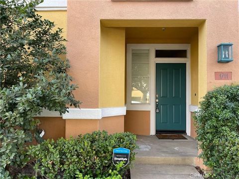 Photo of 1711 Reggio Aisle, Irvine, CA 92606 (MLS # PW26120472)