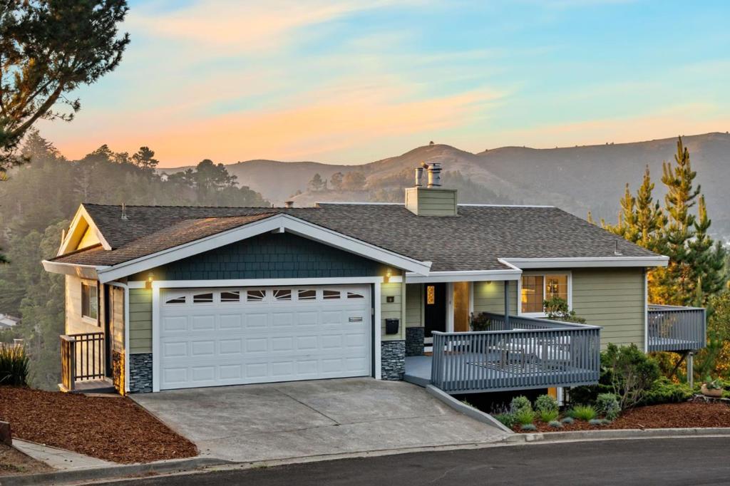 Welcome to your very own mountainside retreat. Tucked away in Pacificas sun-drenched Park Pacifica neighborhood amongst trees and hiking trails - and just minutes away from the beach - this is where serious Tahoe charm meet California coastal cool. Serenity and privacy? Check. Your huge lot, at over 0.8 acres, ensures it. Keep as-is or unwind on any of your large, mountain view decks and imagine all the dream possibilities a yard of this size creates. Step inside for rich hardwood floors, gorgeous vaulted ceilings, and incredible natural light throughout. The main floor is generously laid out with a spacious kitchen, living room, dining area, family room, and convenient half bath. Every detail comes together perfectly with expansive views, cozy gas fireplace, big windows and three glass slider doors to the decks, plus convenient interior access to the garage. Downstairs, the layout is equally as dreamy. Enjoy a luxurious primary suite with walk-in closet and spa-inspired bathroom, two additional bedrooms, another full bath, and flexible office/laundry/mudroom with direct outdoor access. Bonus: the massive unfinished basement space gives opportunity for future plans. At 9 Humboldt, the views stretch longer, the days feel lighter, and life just feels better. Here, you are home.
