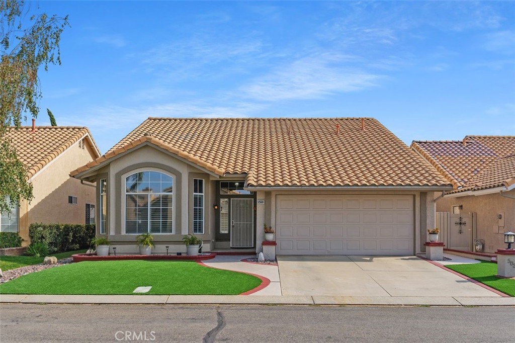 Welcome to 5033 W Hilton Head Dr, a beautifully maintained single-family residence located in the highly sought-after Sun Lakes Country Club, a 55+ community in Banning, CA. This spacious home offers approximately 2,039 square feet of living space, featuring 2 bedrooms, 3 bathrooms, and a versatile loft that can easily be converted into a third bedroom, office, or creative space. The home also includes a 2-car garage and benefits from no Mello-Roos tax, offering added value and peace of mind.
The home features a bright and spacious family room with large windows that fill the space with natural light, complemented by a tucked-away dining area ideal for entertaining. The well-appointed kitchen with new stainless-steel appliances opens to a spacious living room with a fireplace that provides direct access to the expansive low maintenance backyard—ideal for indoor-outdoor living and entertaining.
Sun Lakes Country Club offers resort-style amenities including two 18-hole golf courses, three clubhouses, two pools, three fitness centers, six tennis courts, pickleball and paddle ball courts, bocce ball, a billiard room, libraries, and RV storage. On-site dining includes The Restaurant, The Lounge Bar, and the Sandwedge Bar & Grill, with live music and social events year-round.
Conveniently located near local dining, grocery stores, and everyday essentials, this home offers the ideal blend of comfort, community, and SoCal living.