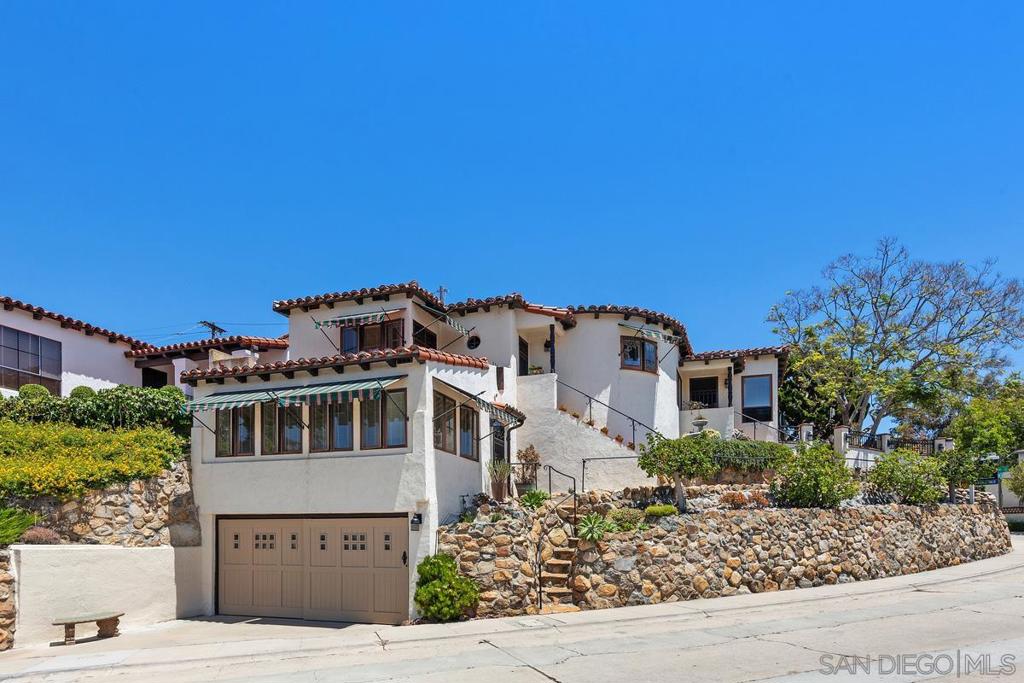 Enchanting and magical Spanish home with 3 bedrooms and 2 bathrooms. Home features hardwood floors, fireplace, central air conditioning and heating, 2 car garage, laundry room, pantry, old world charm throughout, beautiful landscaping, on a corner lot with amazing curb appeal! Main home has 2 bedrooms and 1 bathroom and the large open guest unit/studio with vaulted ceilings also has a full bath. Located in Mission Hills, one of San Diego‘s most desirable communities, close to Balboa Park, world famous San Diego Zoo, restaurants, coffee shops, dessert houses, Little Italy, Downtown, San Diego Bay and so much more. Feel the cool Pacific Ocean breezes from this very unique and special home! This is truly a very special home with amazing curb appeal, great location and private studio. This home exudes old-world charm inside and outside with a private backyard patio with BBQ, water feature and shade sails. In addition, the home has been approved for new windows and doors by the San Diego International Airport Quieter Home program scheduled to be installed in October 2025.
