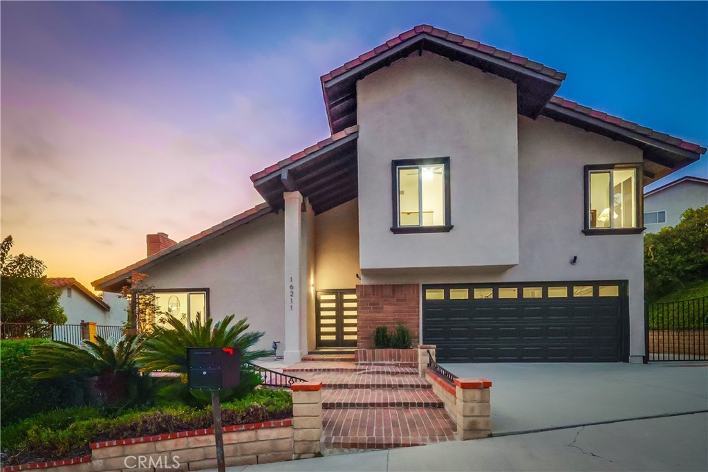 This fully remodeled 4-Bedroom, 2.5 Bath home is located in a secure gated community and offers a thoughtful balance of modern updates and everyday functionality. Inside, you will find beautiful high ceilings, allowing in great natural lighting, a designer kitchen with professional-grade appliances, LED lighting throughout, a dedicated laundry room, and a built-in Ring Security system featuring cameras and doorbell. The private backyard adds a peaceful outdoor retreat, making this move-in ready home ideal for both quiet living and entertainment. Whether you're hosting, working from home, or relaxing outdoors, this house is ready to keep up with your lifestyle. With every detail thoughtfully upgraded, this home offers an exceptional blend of style, function and security.
