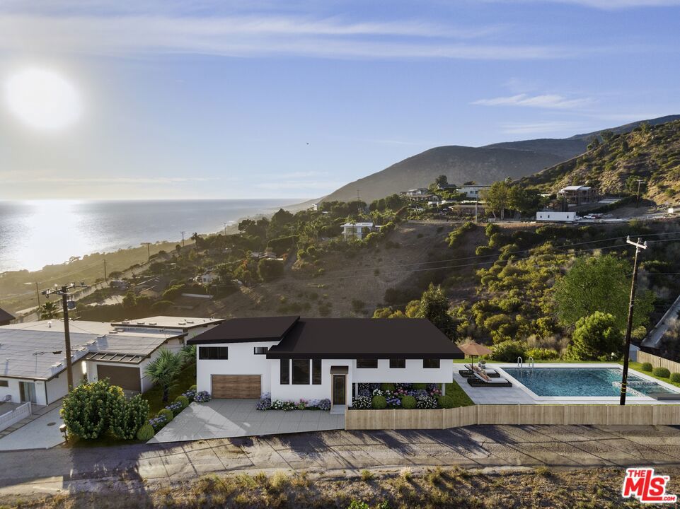 Don't miss this rare opportunity to build your dream home on a stunning 0.8-acre ocean-view lot in Western Malibu, just half a mile from PCH via Encinal Canyon Road. This Woolsey Fire rebuild includes City of Malibu-approved Planning Verification and submitted preliminary plans for a 2,576 sq ft, 3-bed/3-bath home with 656 sq ft of decks, a 576 sq ft garage, and an optional 672 sq ft basement. With approx. 285 feet of street frontage and sweeping views from Point Dume to Santa Cruz Island, this lot offers both privacy and panoramic ocean vistas. It is located minutes from Zuma, Leo Carrillo, and County Line beaches, as well as the Trancas Country Mart and Charmlee hiking trails. The property is ready to go with an approved septic system, installed water meter, and SoCal Gas connection. A local Malibu builder familiar with city permitting is available to complete the project. Build your dream in one of Malibu's most sought-after locations!