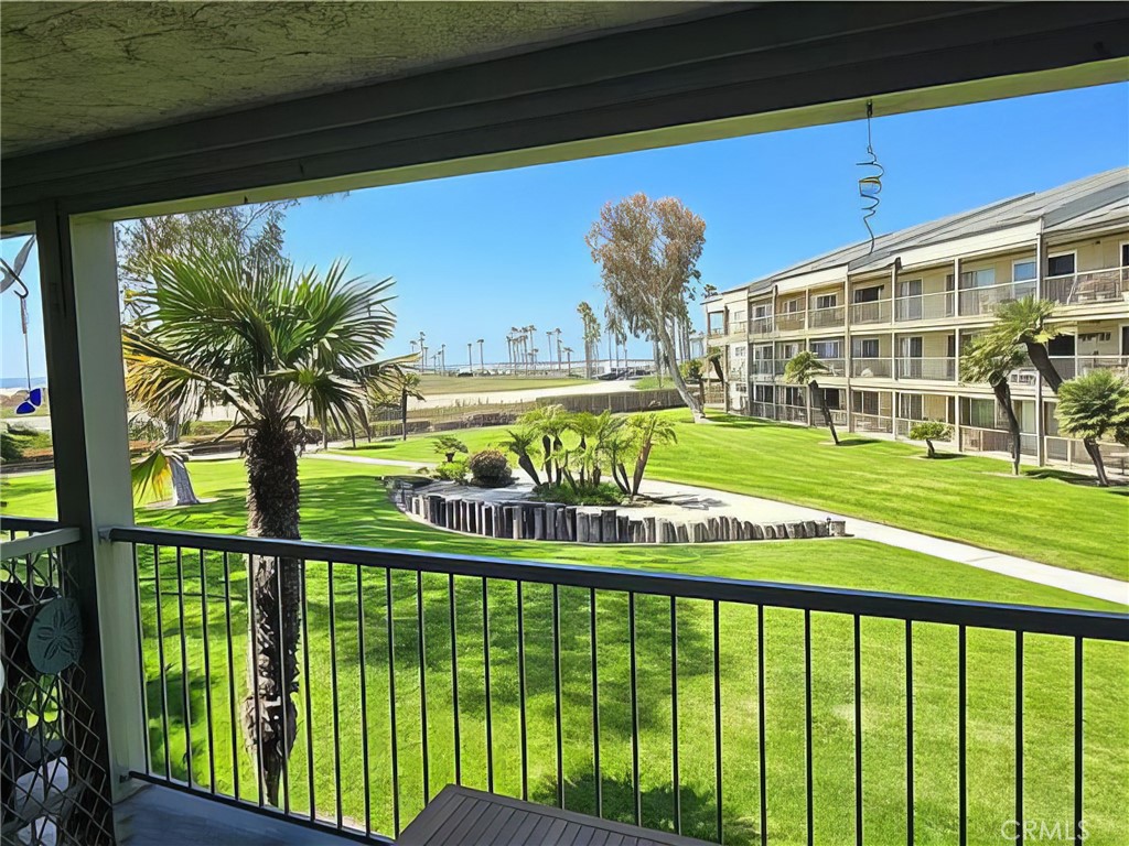 OCEAN VIEW!!!Welcome to your perfect coastal getaway! This exquisite, completely remodeled 2-bedroom, 2-bathroom condo offers sweeping ocean views and effortless beach access directly from the community, ensuring you experience the best of beachside living. Upon entering this stunning home, you’ll be welcomed by an abundance of natural light that fills the spacious, open-concept design. The inviting kitchen boasts gorgeous quartz countertops, new appliances, ample cabinet space, and luxury vinyl floors. The generously sized bedrooms offer a peaceful retreat, while the bathrooms create a spa-like ambiance that will make you feel like you're on vacation every day. Picture waking up to the soothing sound of waves crashing and sipping your morning coffee on the nicely sized balcony, taking in the expansive ocean views and amazing sunsets, or enjoy your coffee indoors next to the cozy electric fireplace. Beyond the beauty of the condo itself, this property provides a wealth of outstanding amenities. Step out to the beach with direct access from the community and rinse off the sand in the outdoor shower. Take a refreshing swim in the pristine pool or relax in the spa, perfect for unwinding after a long day. Stay fit and active in the fully equipped gym, or keep your car spotless with the convenient onsite car wash. The clubhouse and barbecue areas offer charming spots for socializing and can be reserved for private gatherings. For dog lovers, this pet-friendly community includes its own dog park, while sports enthusiasts can enjoy volleyball and basketball courts. This condo blends luxury living, breathtaking ocean views, and exceptional amenities into an irresistible coastal haven.