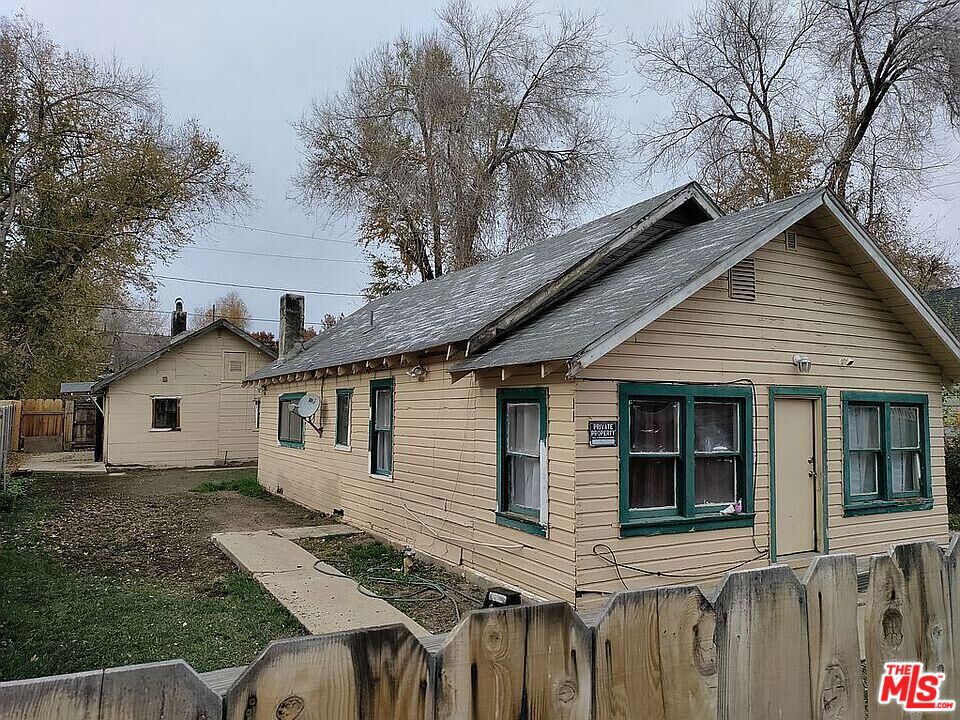 Two homes on one property 2 bd 1 bath and 2bd 1 bath with seperate addresses and utility meters. Both homes are fixer uppers, square footage of 1365 SQ ft is combined with both homes. Investors...2 homes on one lot with 2 different addresses,2 power drops/ meters. Great return on your investment with a little sweat equity and a few updates. When looking at comparison properties be sure to remember this is 2 permitted homes and not just one home! You will see the potential.