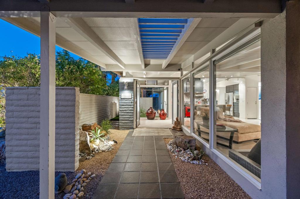 The OWL House. Registered as Historic Site #9 by the City of Palm Desert and listed in 'Historic Landmarks' by the Historical Society of Palm Desert. Silver Spur Ranch 1956. Dramatic rooflines and matching sets of towering twin palms, front and back. The courtyard entry beckons you. Inside, the all white open living space exudes the peace and order of a bygone era! Clerestory windows, expansive beams and full height sliding glass doors are classic design elements that connect the house to nature. (Features commonly used by Walter S. White and William Krisel) 3 bedrooms and 3 baths offer comfort and private spaces. Thoughtfully updated, this is a fine example of high artistic values and the classic Mid Century style designed to celebrate living in the desert. Rest, restore and heal here! Please see HSPD.org at your leisure.