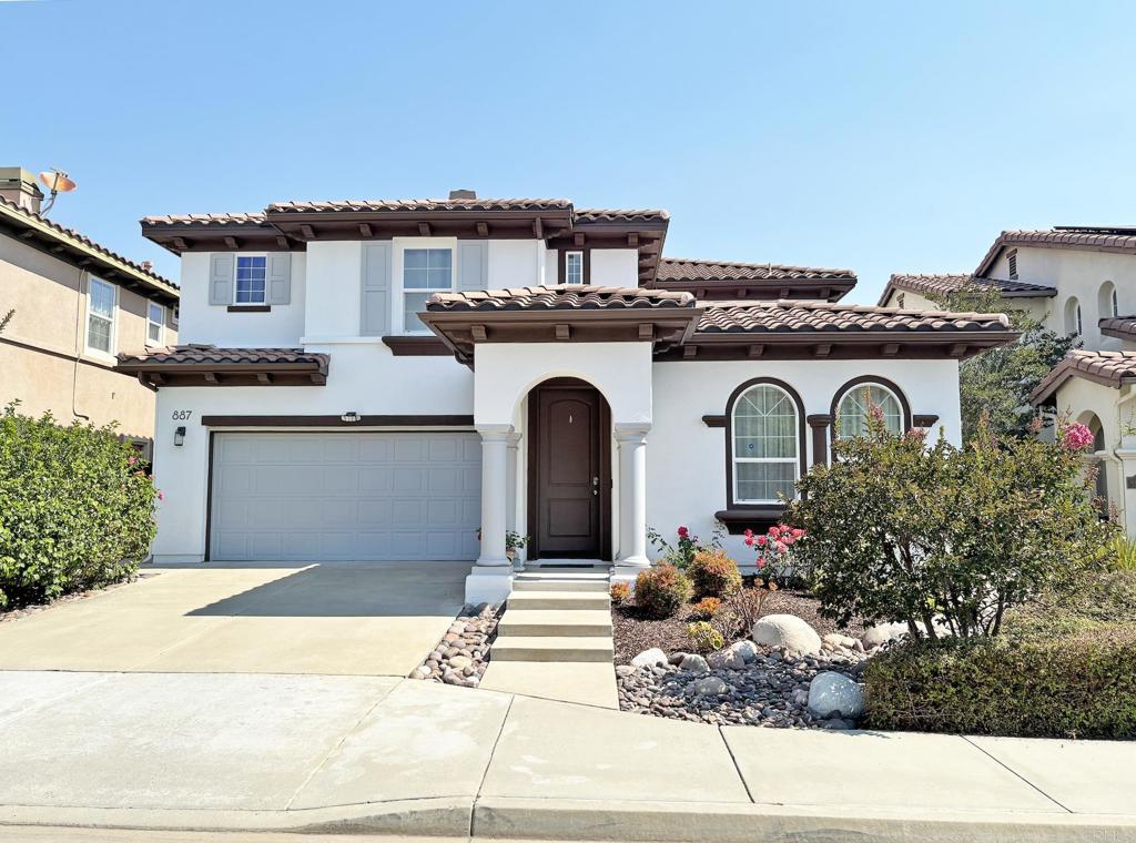 This enchanting home is situated on a peaceful cul-de-sac in the desirable Luminara neighborhood of San Elijo Hills. Beautiful curb appeal and pride of ownership! Step inside the flowing open floor plan and you'll find a formal living and dining room, tranquil courtyard, spacious kitchen overlooking the family room, and an entry level bedroom with full bathroom. The second level features updated floors, a generous sized primary with ensuite bathroom, 3 additional secondary bedrooms, secondary bathroom with dual vanities, and a convenient upstairs laundry room. The backyard is perfect for relaxation and gardening, with lush trees enhancing the ambiance. Zoned for popular Double Peak K-8 School. Great location close distance to trails, parks, schools, Town Square, and all of the amazing amenities of living in the San Elijo Hills community!
