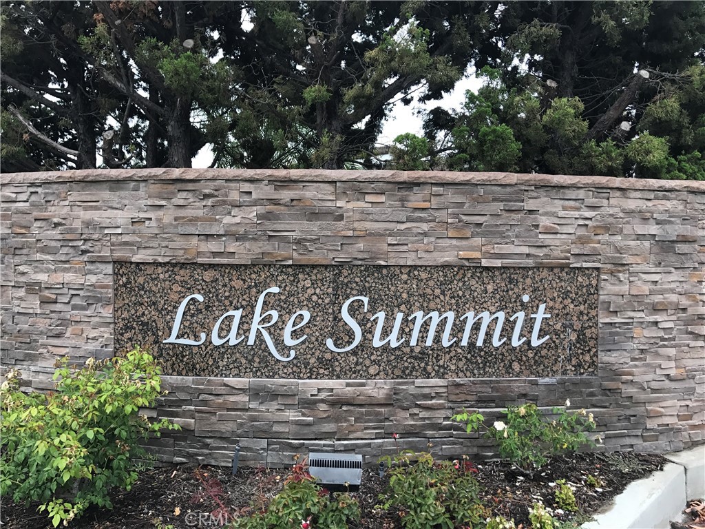 Newer remodeled 3 bedrooms, 2 bath home in desirable community of Lake Summit in Anaheim Hills. Open floor plan with high ceilings, cozy fireplace in the living room with slider glass doors leading to the private backyard with covered patio. Kitchen with newer appliances, including stainless steel refrigerator, and a bright kitchen nook. 2 bedrooms, 1 bath downstairs, lots of storage and walk in closet. Laminated floors throughout the home. 2 car garage with laundry area including Washer and Dryer with storage shelves, EV Car Charger. Community pool, spa, tennis courts, greenbelt, walking paths around the reservoir. Close to shopping, entertainment, and easily accessible to the 241, the 91 & 55 FWY.
