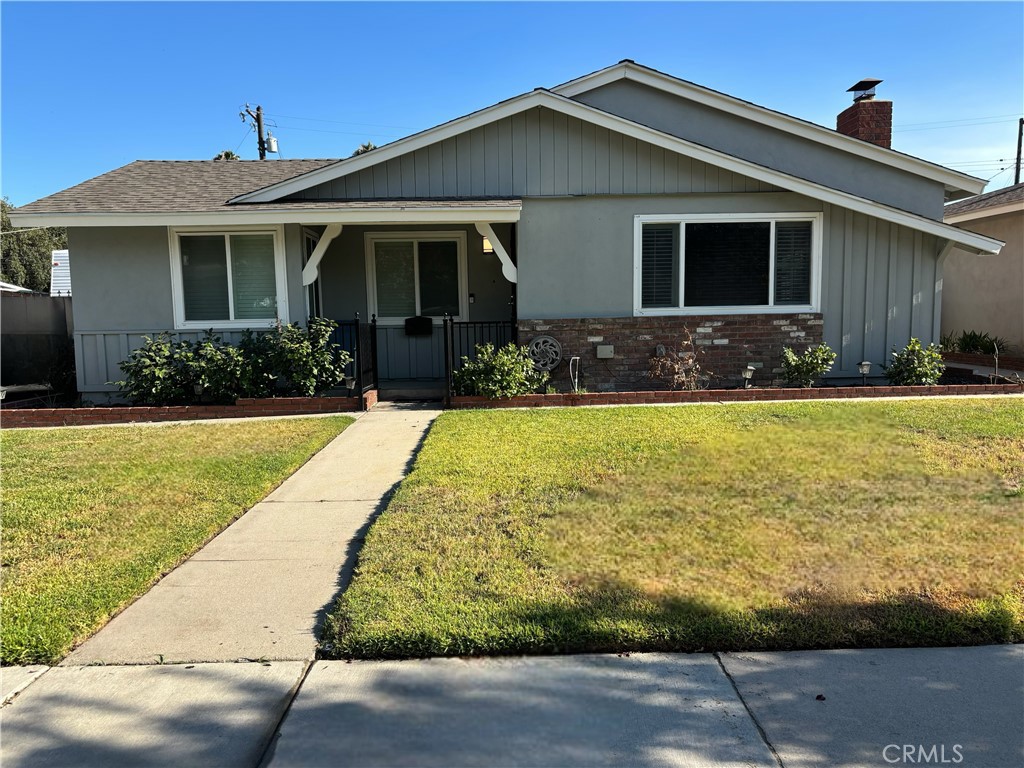 This beautiful, well loved, and well kept family home has been recently remodeled with new kitchen cabinets, quartz countertops, luxury vinyl throughout, & cozy carpet in every bedroom. This home features a spacious detached 2 car garage with a port connecting to the home. Very spacious backyard, fully enclosed by an Approximately 6’ brick wall with a wide privacy gate opening up to the garage. Offering privacy & a safe place for kids to play. Located in a wonderful, quiet neighborhood near east highland. This rental is equipped with all large appliances such as a stove, dishwasher, refrigerator, a Tesla charger, even a washer & dryer. Front yard Landscaping maintenance is also included with your rent, so you can relax and focus on what’s important to you.