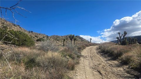 Photo of 0 Pinon Road to Mescal Highlands, Llano, CA 93544 (MLS # SR26022215)