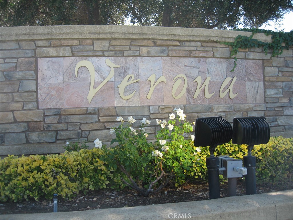 Centrally located in Murrieta in a Gated Community. 2Bd/2Bth with office/den Condo in the desirable Community of Verona. The Kitchen is upgraded with Granite Counter Tops and includes a refrigerator. This Unit has an Open Floor Plan with 2 Ceiling Fans and a very inviting Balcony where one could enjoy their morning coffee. In the cooler months cozy up to the Fireplace in the Great Room. Plenty of closet and cabinet space throughout. Beautiful Laminate Flooring and Neutral Colors add a special feeling of Comfort to this Home. This Unit also includes a Washer, Dryer and Refrigerator. A Garage is also included with this Unit. The Association Pool and Exercise room are close by. This Condo is worth viewing! Just down the street is the Award Winning Elementary School, Buchanan. Close to the 215 and 15 Freeways.