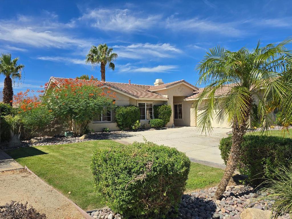 Premium location. Recently updated.New landscaping front and back. Interior completely repainted and new hardware for doors, fixtures and faucets. New custom master shower including oval tub and dual sinks .All rooms have ceiling fans. Entire home has ceramic tile except for a tiled enclosed cutout in the living room that has brand new premium carpet which is also in all closets including the large walk in master closet. All windows have new 2 inch faux coverings along with new tinting. Nice size kitchen next to separate breakfast room. There's also a separate formal dining room. The backyard has a large 'Aluma Wood' covered patio that faces south. Conveniently located minutes to the wonderful shopping and restaurant facilities.