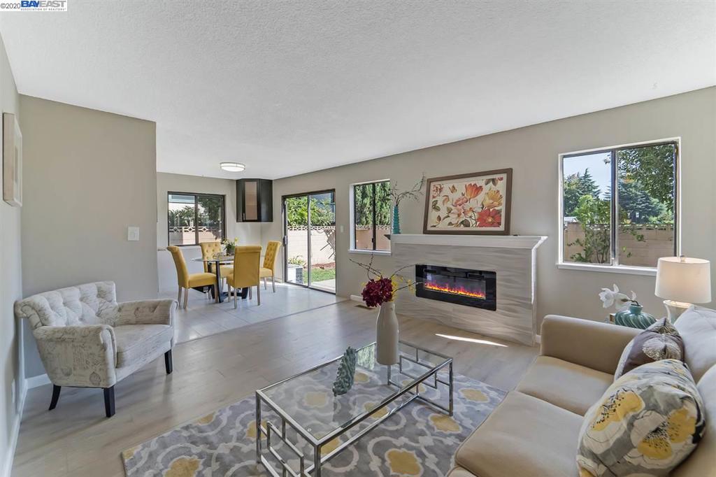 Gorgeous Townhome with new upgrades in a prime location! Elegant, new laminate flooring throughout, new interior paint, central air conditioning, copper pipes, beautifully remodeled kitchen with granite countertops & SS appliances, baths have new toilets, new vanities & tile, Master bedroom has new closet & private balcony. Enjoy once of the largest backyards in the community and a 2 car garage with private driveway. Excellent location - Walking distance to Fremont Hub Shopping Center, Target, Whole Foods, Trader Joes, local restaurants and schools with easy access to Hwy 880 and Bart.