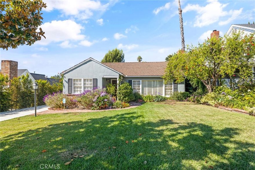 Welcome to a Classic Traditional single-level ranch beauty with a pool, nestled in desirable North West Glendale. The home offers about 2,267 square feet of living space, three bedrooms, and two bathrooms, set on a generous approx 11,562 square foot lot. As you step inside, you’re greeted by an elegant living room anchored by a beautiful fireplace, rich wood floors, and a seating area with built-in bookshelves—a perfect retreat to unwind after a busy day. The galley kitchen draws you in with ample counter space, a garden window, double ovens, and stainless steel appliances, ready for family meals and seasonal entertaining.

Ahead, the expansive formal dining room features a wine closet cellar, wood floors, and a convenient napkin and linen closet, inviting guests to linger over meals and conversation. The expansive den unfolds as a centerpiece of comfort and character, with beamed wood ceilings, wood floors, a brick fireplace, built-ins, and double doors opening to the backyard. Step outside to an entertainer’s paradise where two covered patios overlook a sparkling pool and spa, with plenty of room for gatherings large and small. Parking and potential ADU opportunities are a breeze with a long driveway leading to a detached two-car garage that could be converted into an ADU (city permits required).

The home also includes an inside laundry room, rounding out a practical, well-thought-out floor plan. This Classic Traditional residence captures gracious living with a thoughtful, decorator-ready finish, offering a timeless appeal in a premier Glendale location.