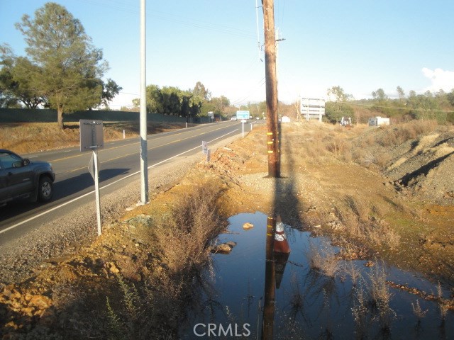 Nice Four Parcels on Very Busy Corner including a total of 7.59 Acres. Parcel AP 068-150-096 is 1.47 Acres included in total acreage and is located across the Hwy. on the NW corner of Olive Hwy & Oro Quincy Road. Even though it has a separate AP number the parcel is legally described as one parcel with AP 068-360-003. Olive Hwy and Oakvale SW corner comprises 6.12 acres. Prime Area for Development with High Traffic Count. Property has Water Meter and County Electrical for Street Lights. Corners have been marked. All parcels to be sold together. Tremendous potential here for Commercial Development. Buyer advised to check with all County Agencies and Utility Services to insure property is zoned and suitable for buyers intended use. Potential Build to Suit. Excellent opportunity for good size development of Commercial Ventures.