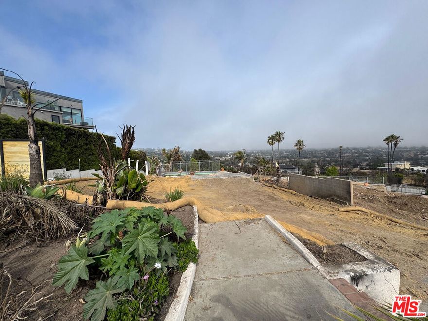 Prime Pacific Palisades Ocean View Lot  Rare Development OpportunityDon't miss this incredible opportunity to build your dream estate on a stunning ocean-view lot in one of the most coveted neighborhoods in West Los Angeles. Located just moments from the Pacific Coast Highway and the world-renowned Getty Villa, this expansive parcel offers panoramic views of the Pacific Ocean, Catalina Island, and the Santa Monica coastline.Nestled in a peaceful and private setting, the property includes an existing pool and offers ample space to design a custom luxury home with indoor-outdoor living that captures the best of the Southern California lifestyle. Surrounded by multimillion-dollar homes, this lot is perfect for developers or end-users seeking a premier location in the prestigious Pacific Palisades.Enjoy easy access to beaches, hiking trails, Palisades Village, Malibu, and the Westside. Opportunities like this are rare  bring your vision and make it a reality.