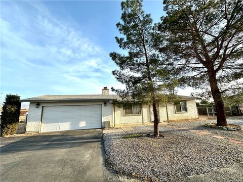 Photo of 22773 Powhatan Road, Apple Valley, CA 92308 (MLS # HD26083496)