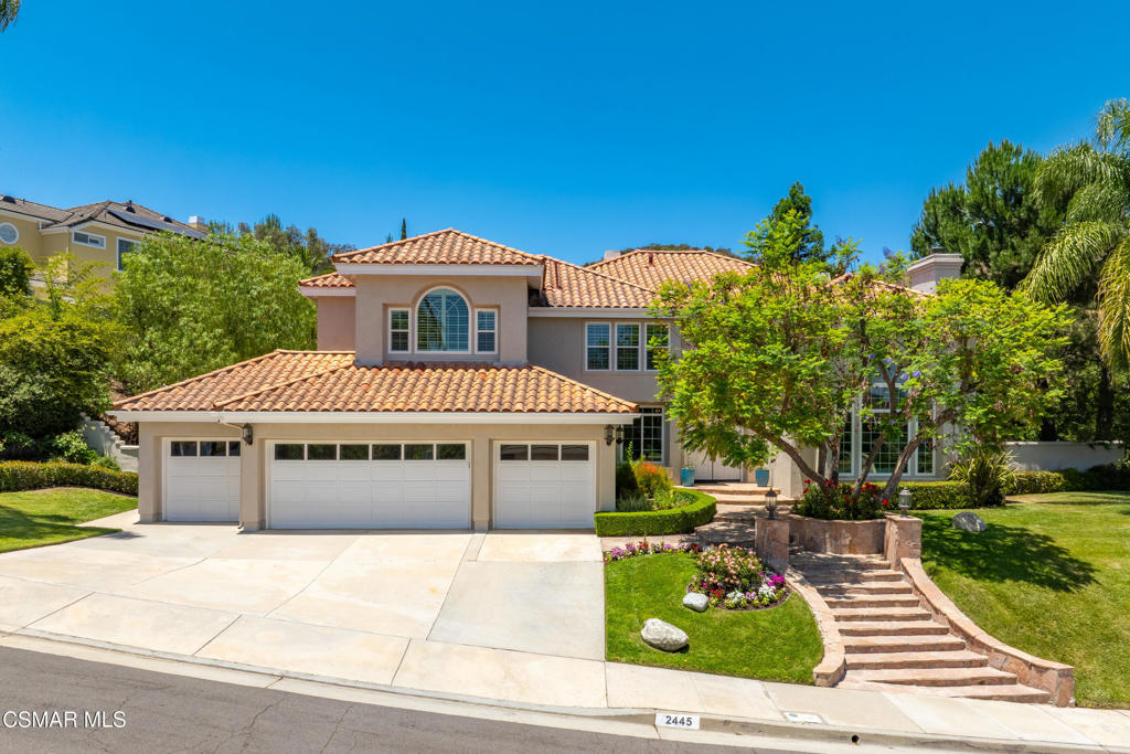 Set atop a knoll in the prestigious Three Springs neighborhood, this home offers luxury living with a private pool, sweeping views, and a rare 4-car garage. The flexible floor plan features 5 bedrooms and 4.5 bathrooms, including a desirable downstairs ensuite--ideal for guests or multigenerational living. The spacious kitchen flows into the inviting family room with built-in bar and opens to the living and dining areas filled with natural light and soaring ceilings. Upstairs, the generous primary suite offers a retreat-like feel with a fireplace, sitting area, dual walk-in closets, and spa-inspired bath. Three additional bedrooms are located upstairs--one with its own ensuite and two that have a hall bath. Step outside to your private backyard oasis with pool, grassy play area, and peaceful views--perfect for relaxing or entertaining. This is a rare opportunity to enjoy comfort, style, and value in one of Westlake Village's most coveted communities.Here for you and your home always,
