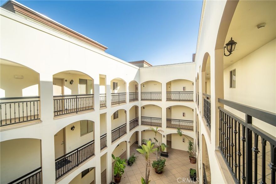 Attention Tenants: Water and Trash is included in the monthly Rent! Welcome to your dream Condo in the heart of Studio City! This beautifully Lighted, ground floor, Updated and modern 2-bedroom, 2-bath unit offers the perfect blend of style, comfort, and unbeatable location. Step inside to discover Rich Hardwood floors throughout, a cozy fireplace, a separate Dining room, the spacious living room overlooking the private balcony, perfect for morning coffee or evening relaxation. The sleek kitchen features Travertine tile flooring, sparkling granite countertops, Stainless Steel Appliances throughout the Open floor Kitchen—ideal for the home chef. Both bathrooms are equally refined, showcasing elegant tile work and quality finishes.  Tucked inside a gorgeous, well-maintained building with a lush, tropical-style courtyard, this unit provides a tranquil escape just blocks from Studio City’s best dining, the weekly Farmer’s Market, and minutes to CBS Studios, Universal Studios, and the Westside via nearby freeways and canyons. This rare gem won’t last long—make it your new home today! Please Note Water, Trash & Gardening is Included in the Monthly RENT!
