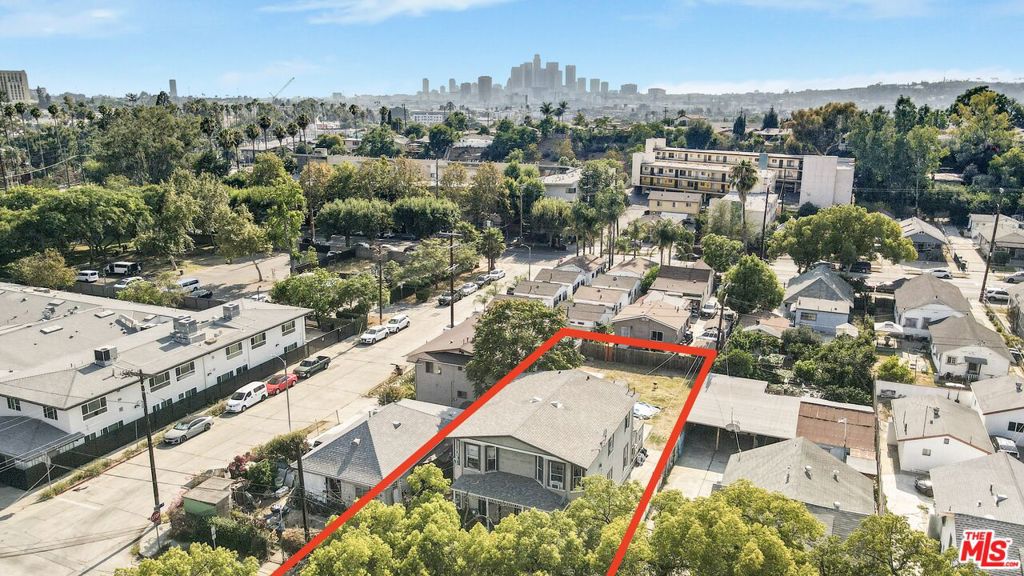 DELIVERED W/ 1 VACANT & BUILD UP TO 4 DETACHED ADUs WITH SB-1211... 2105 Keith Street is a charming craftsman-style 4-unit apartment building located in the historic Lincoln Heights neighborhood of Los Angeles. One of the units will be delivered vacant by 12/1/2025, perfect for an owner-user. The property is situated on a 7,512 square foot lot (approx. 50' x 150') and features a unit mix of (4) one-bedroom/one-bath units averaging a spacious 783 square feet each. A vacant backyard pad measuring approximately 70' x 50' provides a unique opportunity for additional density, including the potential to construct up to four (4) detached ADUs under California state law SB-1211 (buyer to verify). The property also offers investors a compelling value-add opportunity, with three out of the four units currently leased at below-market rents with more than 63% rental upside - achievable through renovations and lease turnover. The building is separately metered for gas and electricity, reducing operating costs for ownership. Ideally located, 2105 Keith Street sits just minutes from the USC Health Sciences Campus and Los Angeles General Medical Center, two of the area's largest employment hubs. The property is also a short drive from Highland Park, Echo Park, and Boyle Heights, three of LA's strongest rental submarkets, providing sustained tenant demand. Offered at $900,000, which equates to $225,000 per unit and $287 per square foot, 2105 Keith Street presents investors with an extremely attractive basis and clear paths to drive future value. With its Craftsman character, strong submarket fundamentals, substantial rental upside, and unique ADU development potential, this is a rare Lincoln Heights multifamily opportunity suited for both seasoned investors and new buyers alike.
