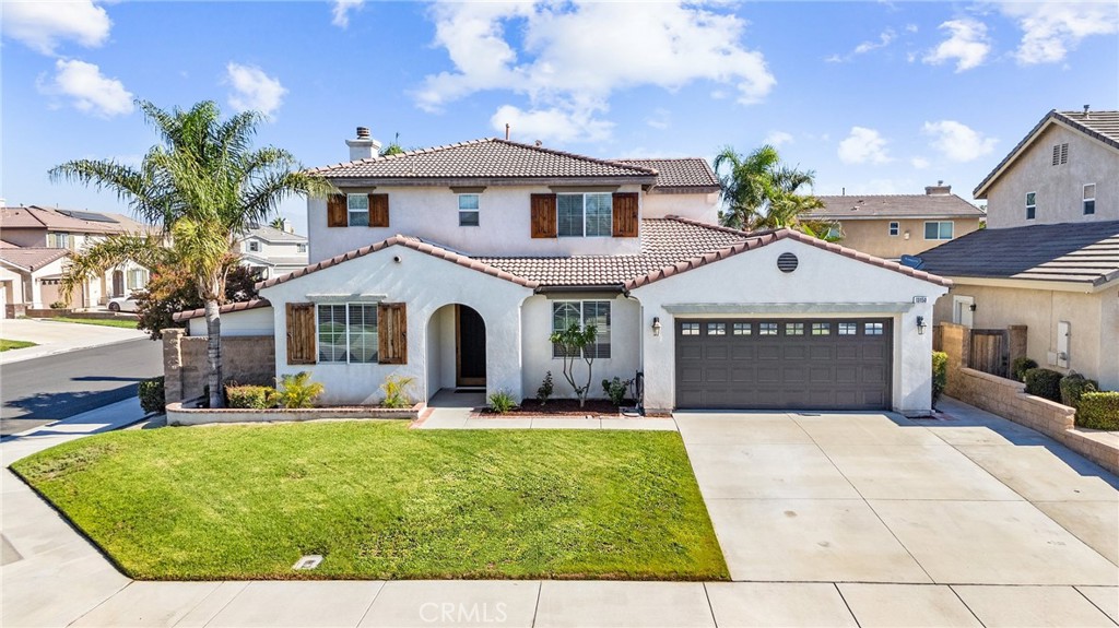 Welcome to this beautiful and spacious two-story home situated on a very desirable corner lot in the highly sought-after Heartland community of Eastvale. Featuring 4 bedrooms and 3 bathrooms, one bedroom and bath downstairs. There is a large den/office area downstairs as well. This well-maintained residence offers both functionality and charm. The heart of the home is the chef’s kitchen, complete with granite countertops, dual ovens, a walk-in pantry, and included kitchen refrigerator—perfect for everyday living and entertaining. Enjoy the inviting family room with a stylish wood accent wall, fireplace and custom cabinetry throughout. The home also boasts mirrored closet doors, ceiling fans, and shutters that add a touch of elegance. The primary suite is a true retreat with an ensuite bath and a large walk-in custom closet designed for optimal organization. Additional highlights include a private indoor laundry room with sink and included washer/dryer, and abundant natural light from well-placed windows. Step outside to the spacious backyard featuring a cozy wood-burning firepit, a covered patio for relaxing or entertaining, and a large detached workshop/shed for extra storage or hobby space. The oversized tandem garage includes a convenient rear roll-up door that opens directly to the backyard, perfect for added flexibility. With close proximity to top-rated schools, parks, and shopping centers, this exceptional Eastvale home offers comfort, convenience, and space for everyone. Don’t miss out on the opportunity to make it yours! NO HOA