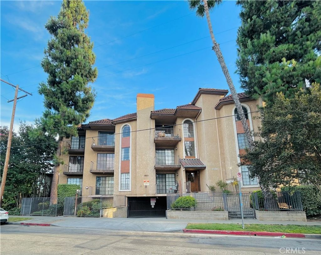 Photo of 18600 Clark Street #306, Tarzana, CA 91356 (MLS # OC26147172)
