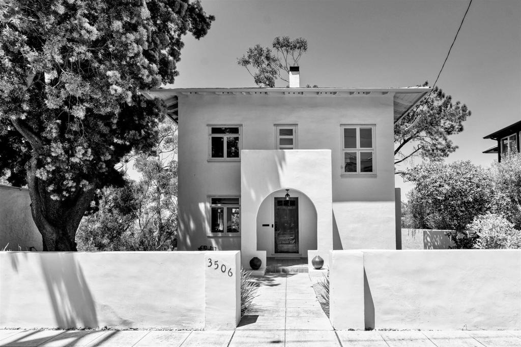 The G.W. Simmons Residence, c. 1909. Offered for the first time in over 45 years, the G.W. Simmons Residence is a landmark of architectural significance and innovation. Designed by Master Architect Irving J. Gill, this seminal work is heralded by Save Our Heritage Organisation (SOHO) as “remarkably... constructed a year or more before the earliest modern movements that would emerge in Europe,” ...a significant precursor to Modern Design and an embodiment of Gill’s visionary philosophy. Nestled on a generous, tree-filled promontory with Canyon and Bay views in the Heart of Bankers Hill’s Historic District, this incredibly special property offers a rare opportunity to live in harmony with nature, where simplicity, serenity, and architectural legacy converge. A once-in-a-generation offering, where less truly is more. Not to be missed.