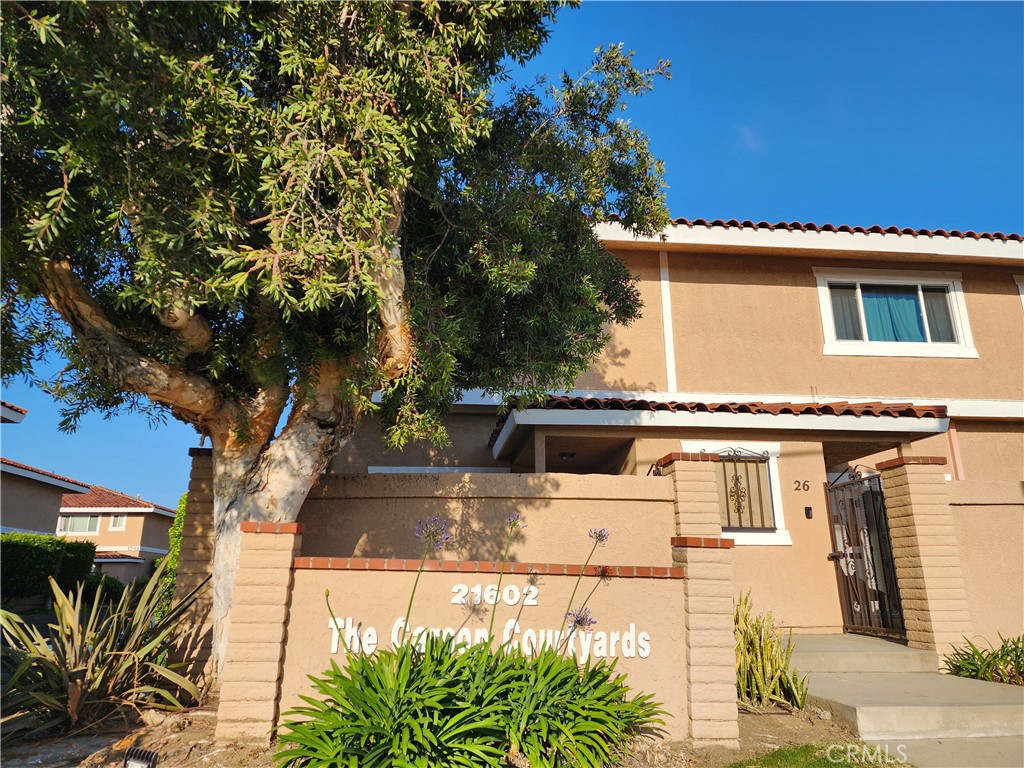 Welcome home!! Don't miss this cozy and well-kept 2 Bed, 2.5 Bath condominium located in the well-established and maintained, Carson Courtyards Community. Enter through a secured gate onto your quiet, private patio perfect for entertaining or relaxing. The home's open floor plan and flow are seamless, as you enter through the front door and into the living room space and onto the dining room area and kitchen. Granite countertops, beautiful white wood cabinets throughout the entire kitchen, and recessed lighting. This will make any cook feel at home as you look out to the dining room area. Upstairs, you will find the spacious primary bedroom with the 2nd bedroom just down the hall. The primary bedroom features a private bathroom featuring a granite vanity with a shower and bathtub, perfect for relaxing anytime. Carson Courtyards community features many amenities Pool, Jacuzzi, and clubhouse. Conveniently located close to award-winning schools, shopping center's, restaurants, 405. 110. and 91. freeways. Don't miss out on this one!