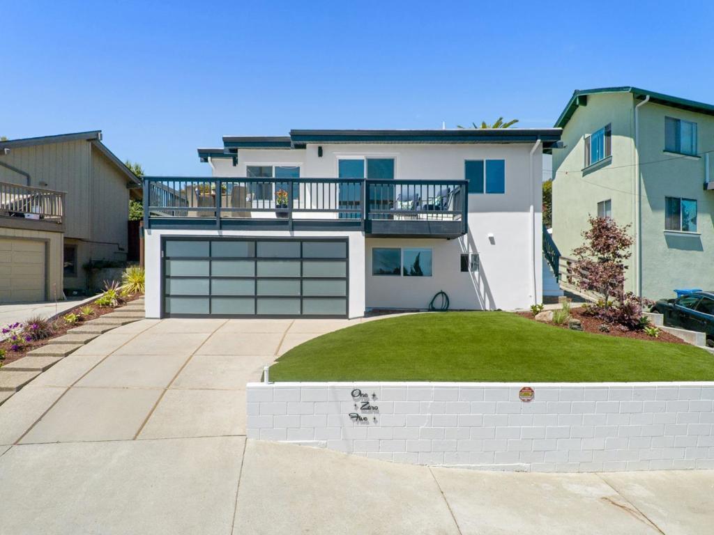 Perched just above the Aptos Village, 105 Vista Mar Ct features a BIG Pacific Ocean view and open floor plan with almost the entire home seeing a transformative renovation into a modern showpiece. The landscaped backyard is enormous and perfect for entertaining friends and family. The home has been renovated over the past few years including a new kitchen, appliances, bathrooms, European Oak engineered hardwood flooring, paint, modern lighting, gas insert fireplace, fencing and more. All of the living space and 2 bedrooms & 2 bathrooms are on the main level. The large primary bedroom with ensuite bathroom and spacious his and hers closets opens to the redwood deck and backyard. The backyard is special and consists of mature trees including a lemon and persimmon as well as rose bushes and Camellia trees. Ideally located only a 2-3 min drive to Rio del Mar Beach and a 5 min walk into the redwood forest of Nisene Marks. This is the perfect location for those who like to walk to dinner or drinks or both! Several restaurants including sushi, bbq, Thai, burgers, wine tasting, a pub and New Leaf Market are all just steps away. 2 car garage with EV charger and private guest suite. The list of upgrades is extraordinary & this is the one you have been waiting for!