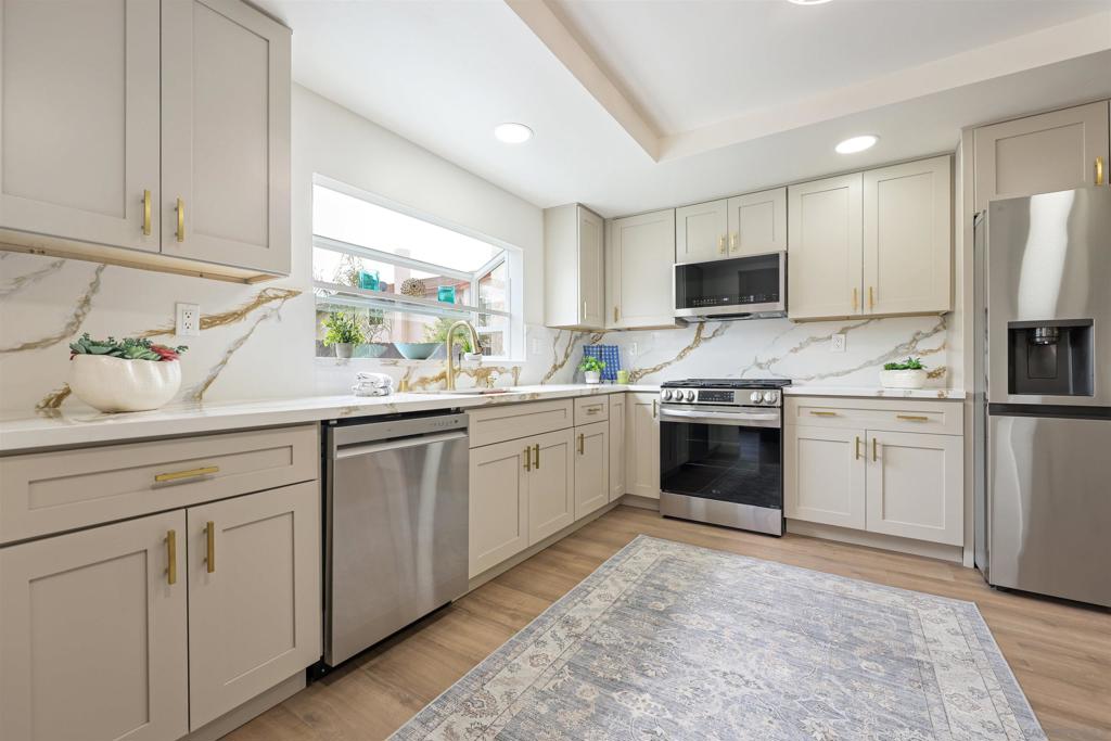 ***PAID OFF SOLAR***** We’re pleased to present this beautifully remodeled two-story home, ideally located on a peaceful cul-de-sac in one of Chula Vista’s most desirable pocket communities. With 4 bedrooms, 3 bathrooms & bonus room, this home offers space, style, and privacy—all in one perfect package. The updated kitchen is the heart of the home, featuring quartz countertops, brand-new stainless steel appliances, and modern finishes. Downstairs, you’ll find durable and stylish luxury vinyl flooring throughout, enhancing the home’s warmth and modern appeal. The family room features a cozy fireplace—perfect for quiet nights or weekend movie marathons. Upstairs, the spacious primary suite includes a private space/bonus room, ideal for a home office, nursery, gym, or personal retreat. The home also boasts a new HVAC system and furnace. Schedule your viewing soon, it won't last!