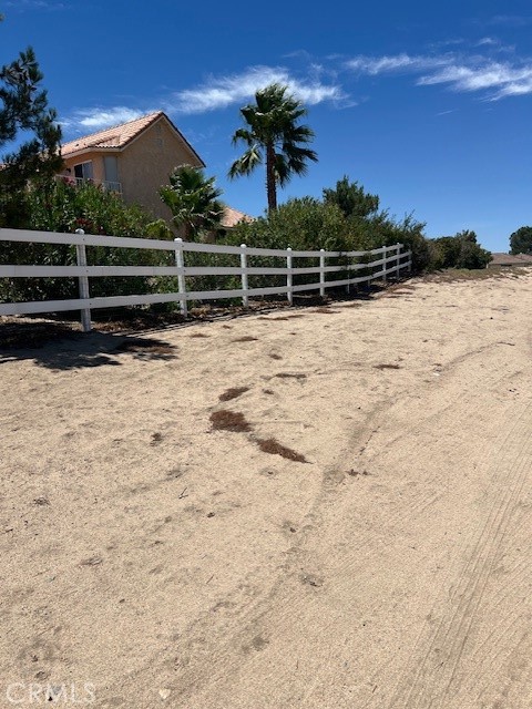Vacant lot at the corner of Bay Meadow Dr and Caballero Dr Equestrian horse property in Spring Valley, Access to lakes and a golf course. Shopping movies theater and gym close by . Gateway to Joshua National .