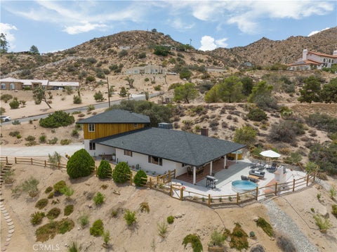 Photo of 53788 Ridge Road, Yucca Valley, CA 92284 (MLS # JT26231599)