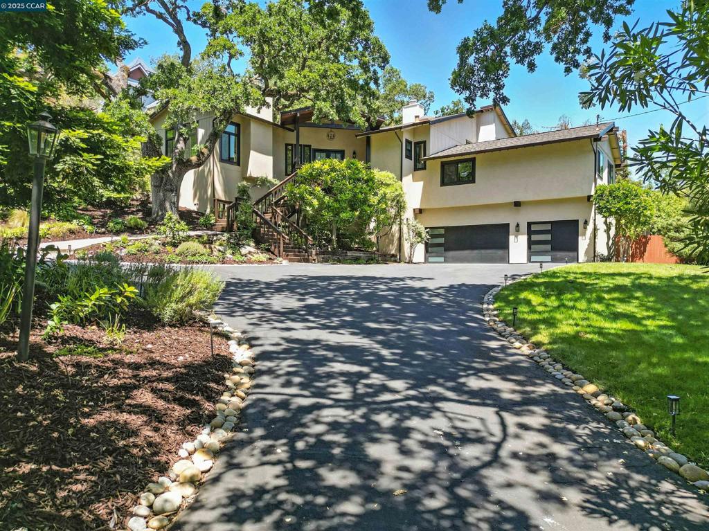 Welcome to 1542 Hillgrade Ave, Alamo – A Stunning Modern Retreat in a Premier Westside Location Saturated with natural light and thoughtfully renovated throughout, this exquisite home is nestled on the desirable Westside of Alamo, just steps from local walking and biking trails. The beautifully landscaped front and private backyard feature an in-and-out driveway, lush greenery, and mature fruit trees—a perfect blend of functionality and serenity. Step inside to experience a high-end renovated interior boasting high-end Thermador appliances, modern-style fireplaces, and elegant touches throughout. The primary suite offers a spa-like escape with a beautifully upgraded custom tailed master bathroom, while Restoration Hardware-style chandeliers, glass-panel stair railings, and designer finishes elevate the aesthetic throughout the home. Located minutes from freeways, top-rated schools, and shopping centers, this home offers the perfect balance of modern luxury and everyday convenience. Don’t miss the opportunity to own this exceptional Alamo residence that truly checks every box!