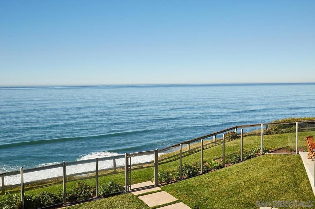 Rare Opportunity! Experience panoramic ocean & whitewater views from this prime Encinitas location west of Highway 101. This spacious, fully remodeled 2 bed/2 bath residence offers stunning views from primary living area & primary bedroom, plus the two ocean view balconies! In-unit washer/dryer is added bonus! Upgrades include custom chef’s kitchen, designer bathrooms with ceramic tile/ premium Kohler & Moen fixtures, + European brushed oak wood floors throughout. Two assigned parking spaces in secure gated parking area, community pool and spa. Just a short stroll to Swami’s Beach, shops & restaurants. This beautifully upgraded oceanfront home captures the essence of quintessential Encinitas living in a premier location—just steps to beaches and the vibrant village. Enjoy the feeling of being on permanent vacation with Swami’s and “D” St. beach access nearby + charming cafés, yoga studios, farmers market, boutiques, train station, world-class dining, + Moonlight Beach all within easy walk or bike ride! The spacious single-level floor plan has been fully remodeled with designer finishes, including custom lighted kitchen cabinetry, quartz counters, tile backsplash, stainless steel appliances, and sit-down breakfast bar. Two primary suites each feature lux remodeled bathrooms with tile showers, quartz counters, + premium Kohler and Moen fixtures. One suite even includes a private entrance—perfect for guest privacy. Additional highlights include recessed Hyperikon LED lighting throughout and cozy, remote-controlled electric fireplace in living room. Subject property is located on second floor of three story building with stair access only. Complex does not have elevator. Unit itself is single level. Tenants allow showings after 2:00 on weekdays, and on weekends with enough prior notice. Listing agent to arrange and accompany all showings.