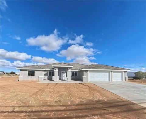 Photo of 17576 Hercules Street, Hesperia, CA 92345 (MLS # HD25249989)