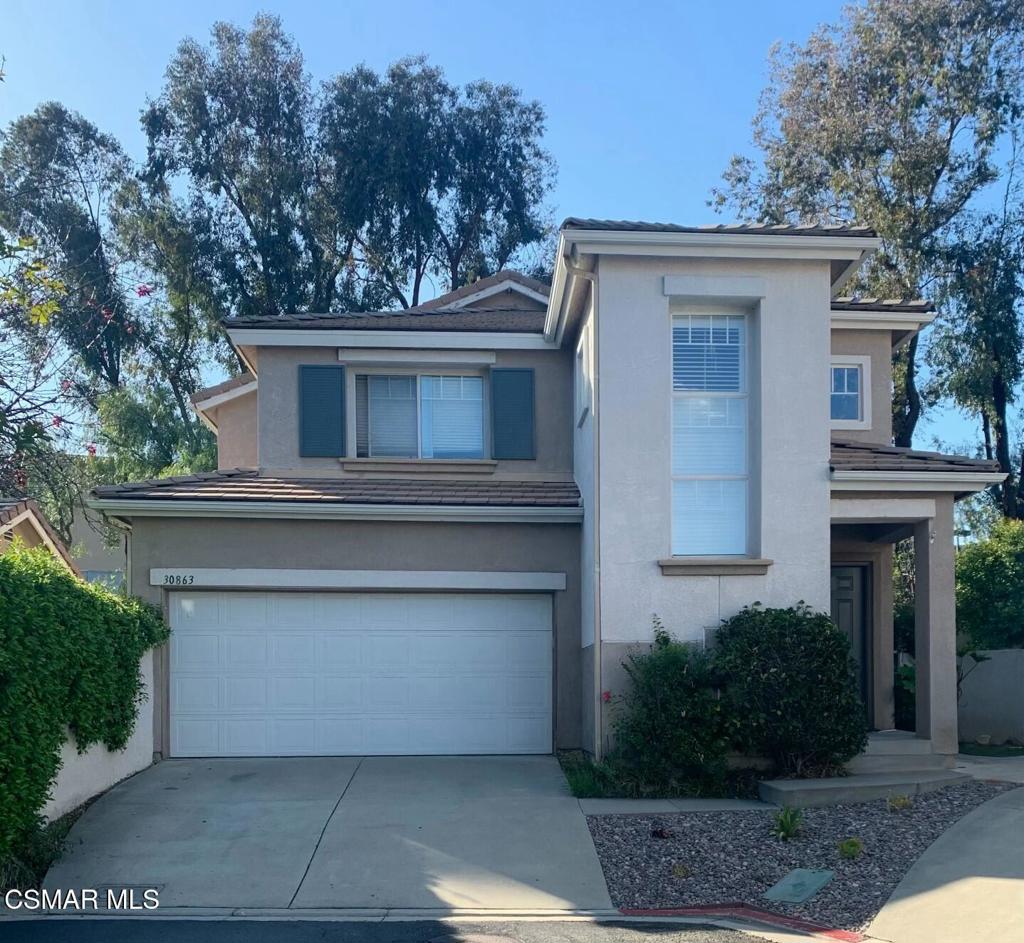 Lovely single family home with a cul-de-sac location with the largest backyard in the development. Gated community. Newly painted throughout the house. Wood-like floors. Granite counters in the kitchen with newer refrigerator, stainless steel appliances. New recessed lighting.Primary bedroom has a walk in closet as well as the secondary bedroom. Loft area is the size of a bedroom without a closet. Newly landscaped backyard. Owner will pay for water until October 15, 2025. Community pool, spa and play area. Award winning Las Virgenes school district.