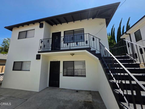 Photo of 12246 1/2 Oxnard Street #1st Fl, Los Angeles, CA 91606 (MLS # P1-26159)