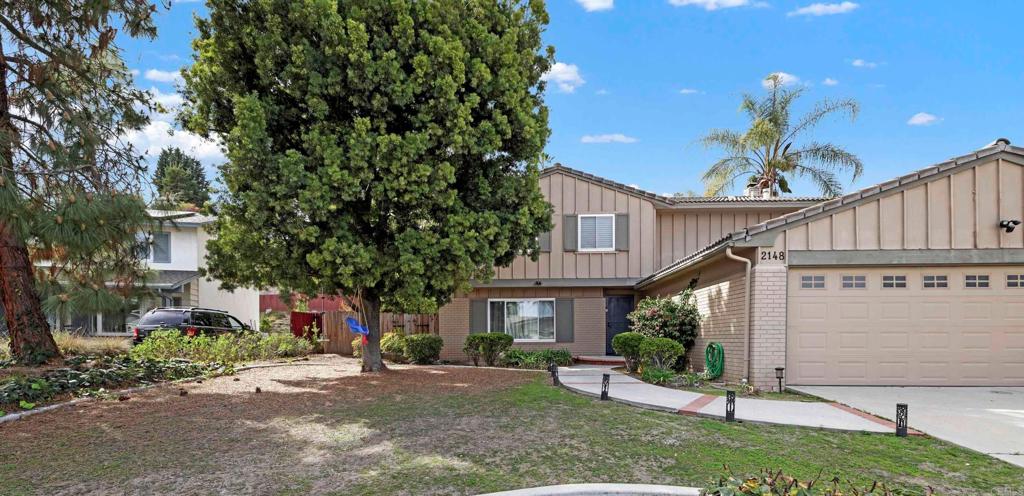 Enjoy this spacious family home in great neighborhood bordering Santee and El Cajon. The home features Four Bedrooms, two and a half Baths, with a large living room attached to the Dining Room. Custom Kitchen boosts quartz counter tops and lots of custom cabinetry. Kitchen opens to family room with slider out to Pool and Patio area. There is a Sunroom that is not included in square footage. Huge yard (.41 ac) with mature fruit trees and room on back for more!. Three car garage. This home is located close to schools, shopping and freeways.