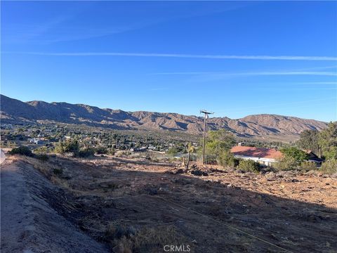Photo of 54610 Navajo, Yucca Valley, CA 92284 (MLS # JT26082443)